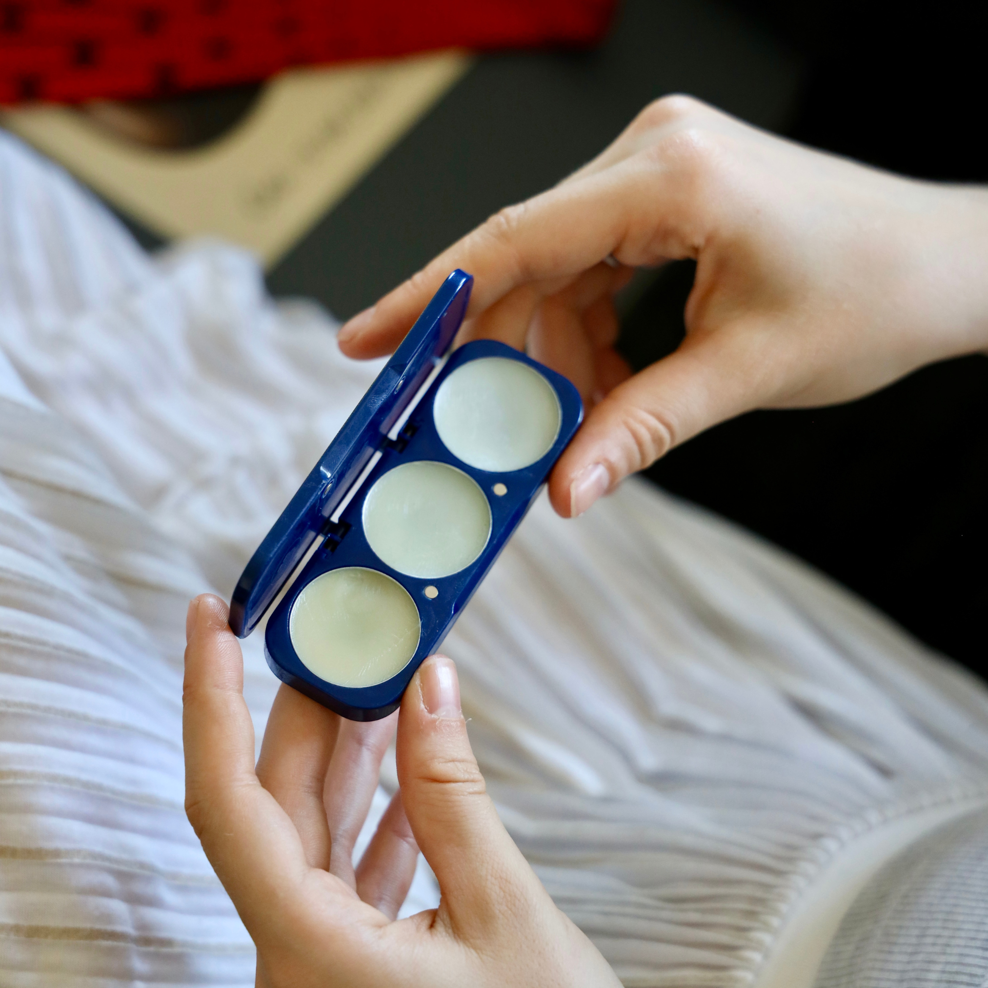solid perfume in a compact